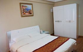 Best Coast Hotel Apartment Xinghaitun